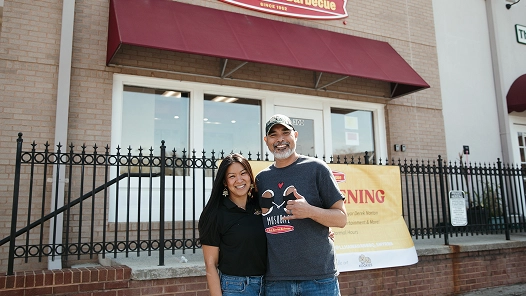 New L&L franchise owners celebrating their restaurant opening